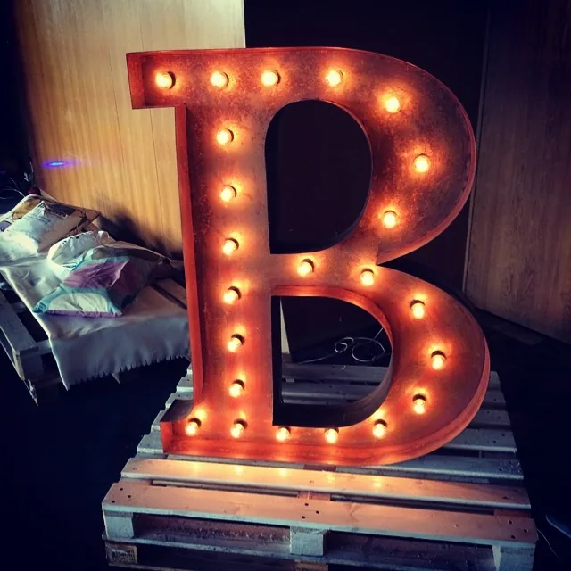 Illuminated letter B on a pallet