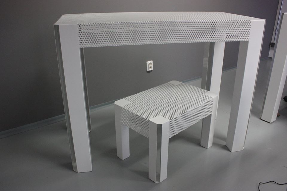 Custom powder-coated perforated steel showroom furniture